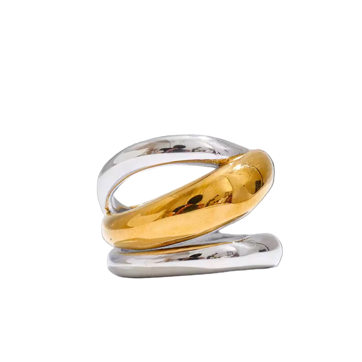 Two gold rings stacked on a gray background